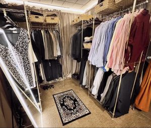 a photo of a closet full of professional dress clothes