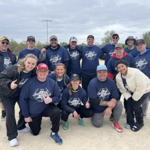 a photo of students after a softball game