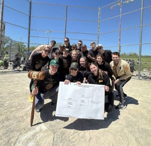 a photo of students playing softball